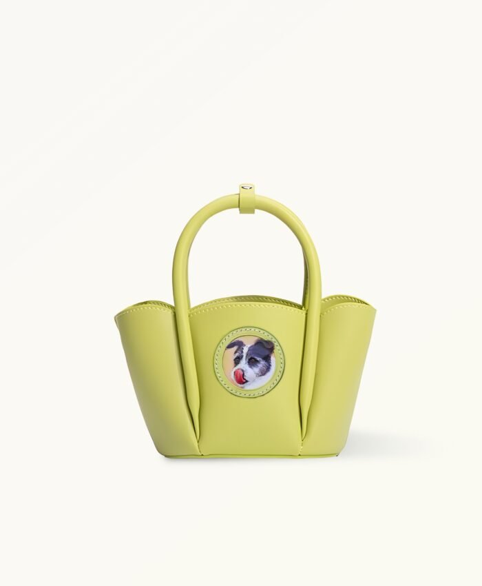 Personalized pet portrait on unique petal-shaped leather bag